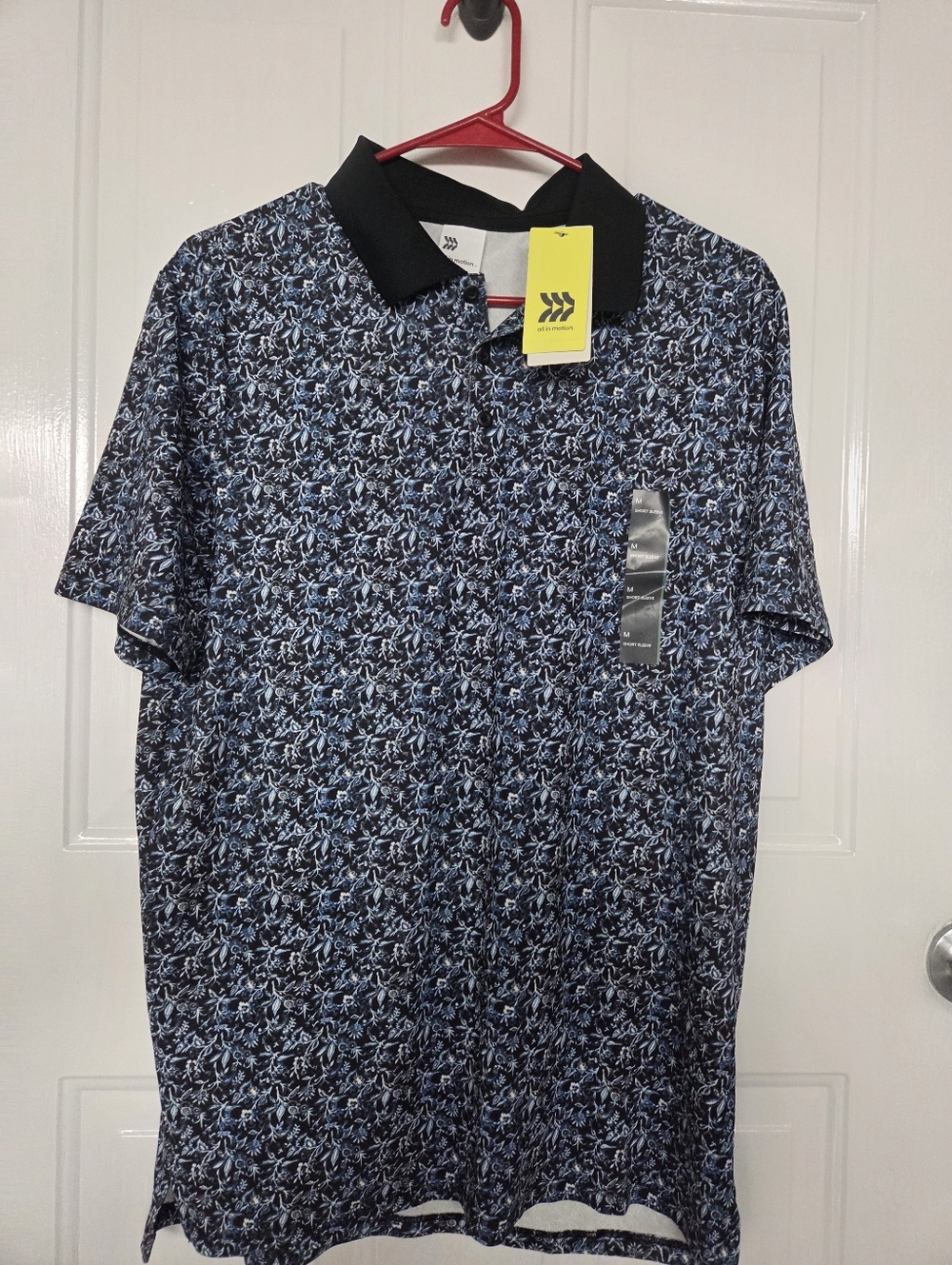 Golf Men's Navy Blue Floral Polo Shirt with Black Collar med